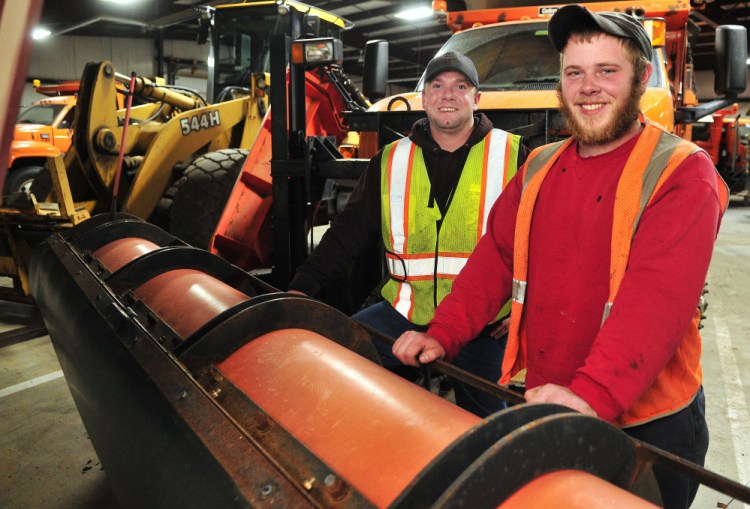 City workers Manny Proctor, left, and Justin Miller, both of whom recently got certified to drive a plow truck for the city this winter, pose for a portrait on Thursday at the John Charest Public Works Facility in Augusta.