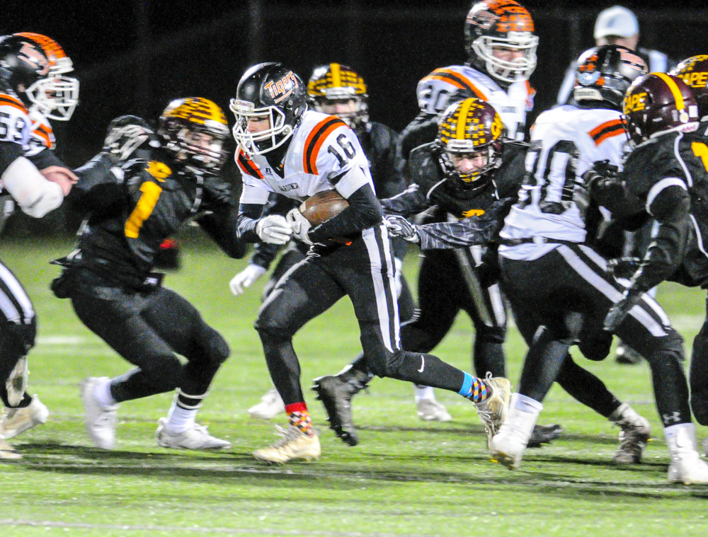 Gardiner running back Collin Foye looks for extra yards during the Class C South title game Friday at Cape Elizabeth.
