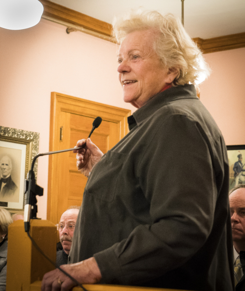 Linda Bean, center, addresses the Hallowell City Council on Monday evening during a discussion about the city's plan to move the historic Dummer House. Bean, the granddaughter of L.L. Bean's founder, owns the Dummer House and adjacent property.