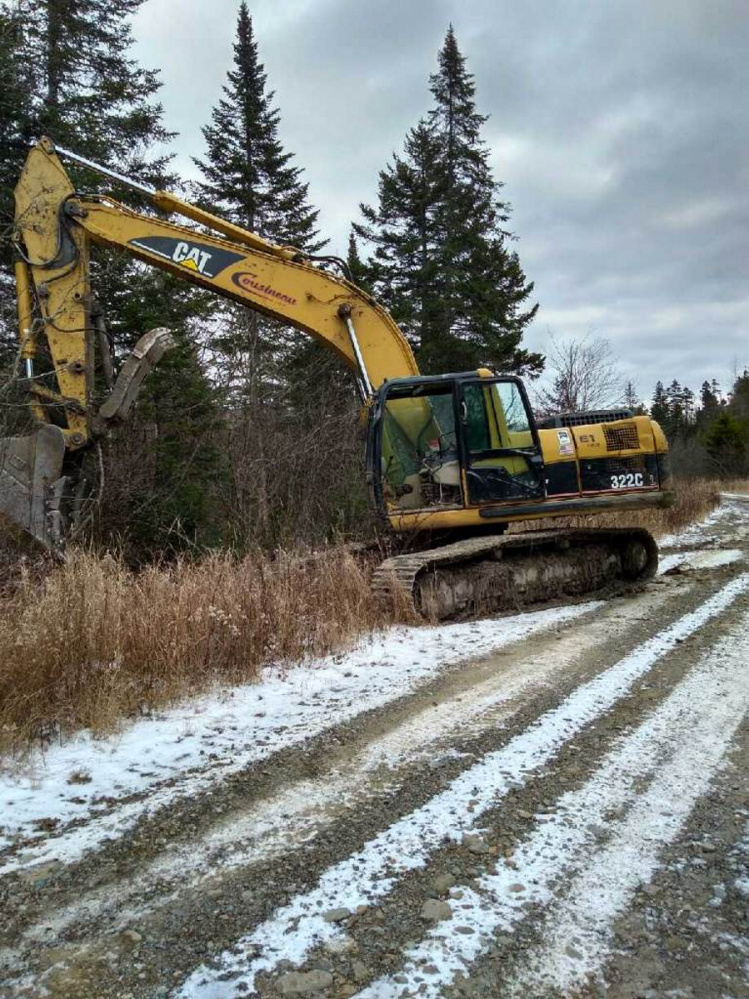 This track excavator, owned by Cousineau Inc. in Wilton and discovered Tuesday in Sandy Hill Plantation, was stolen but not damaged.