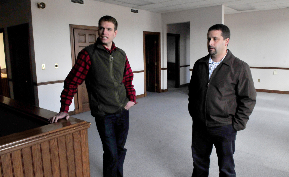 Sam Hight, left, and Matt L'Italien, the director of Somerset Public Health, said on Wednesday they expect the building at the corner of Madison Avenue and Elm Street in Skowhegan to be brought up to code and equipped with updated data lines, and to become home to the health coalition by the beginning of December.