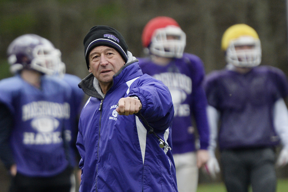 Marshwood football coach Alex Rotsko talks with his players Tuesday in South Berwick.