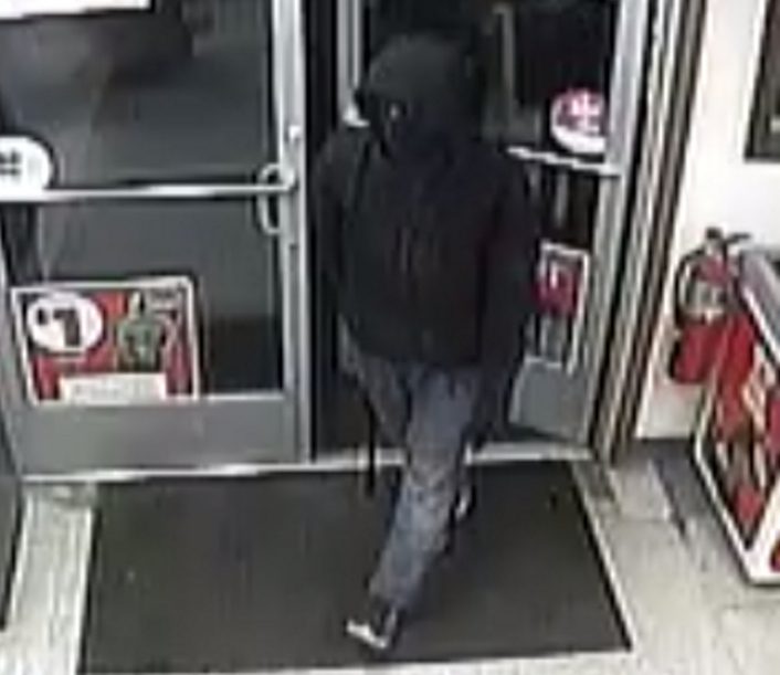 Security camera footage of a suspect in armed robbery of Circle K in China on Sunday.