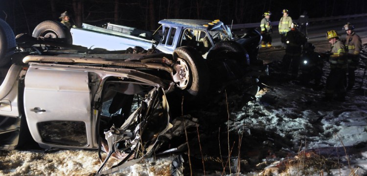 Firefighters check pickup trucks that collided on Jan. 4, 2016, on Route 9 in Chelsea, injuring three people. All the victims had to be extricated from the vehicles, police said, and to be treated for multiple life-threatening injuries.