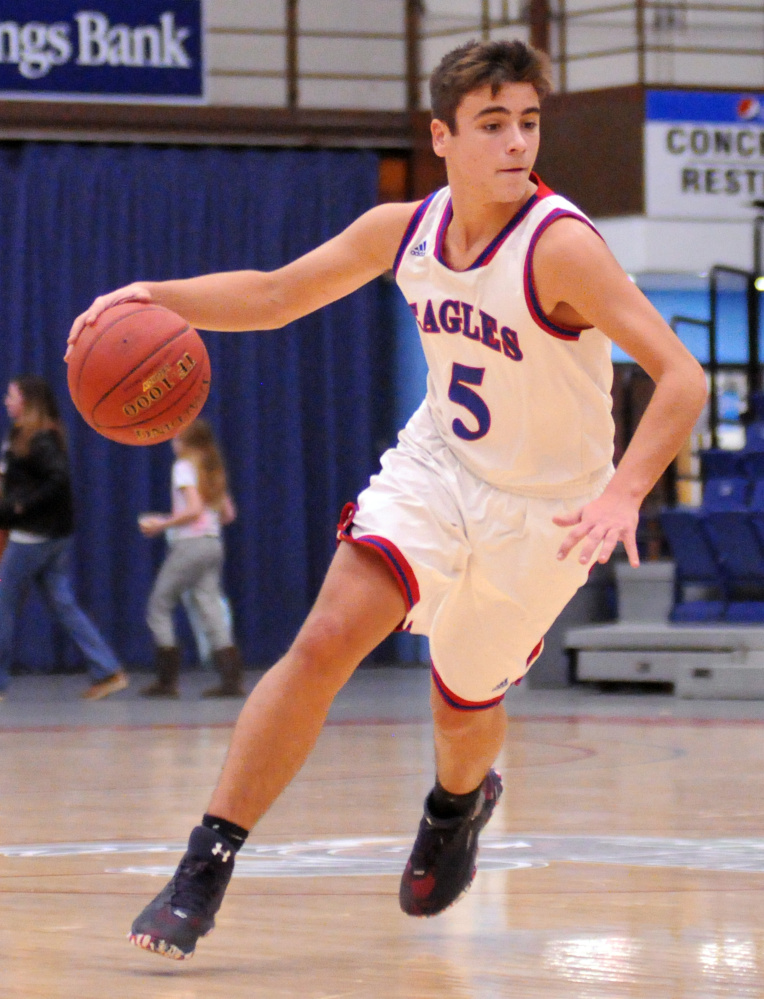 Messalonskee's Chase Warren dribbles the ball during a high school basketball game last fall at the Augusta Civic Center.