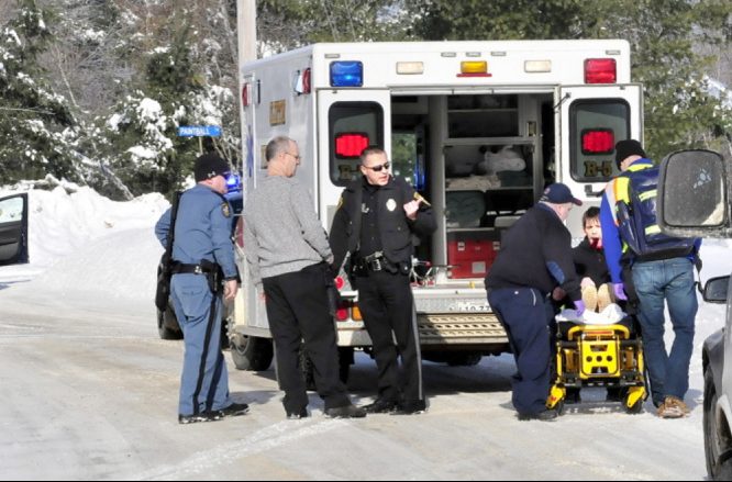 Edward Domasinsky is loaded into an ambulance Jan. 5, 2014, with injuries to his face that police say were self-inflicted after a domestic dispute with a woman at a residence on Horseback Road in Clinton.