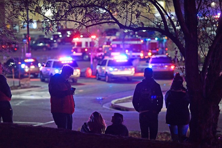 Dozens of police cruisers and emergency vehicles converged at the scene of the shooting in Thornton, Colorado, Wednesday night. 