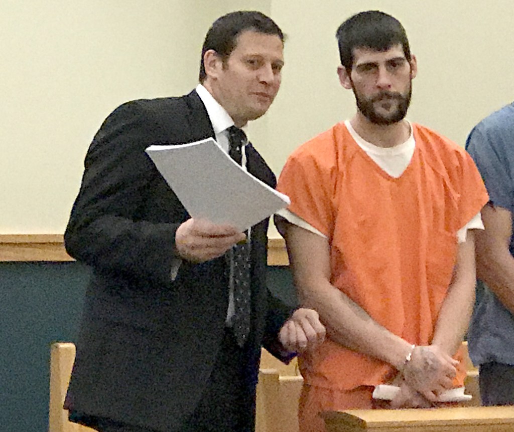 Jason Wotton appears with attorney Richard Charest in 8th District Court in Lewiston on Monday. Wotton is charged with elevated aggravated assault.