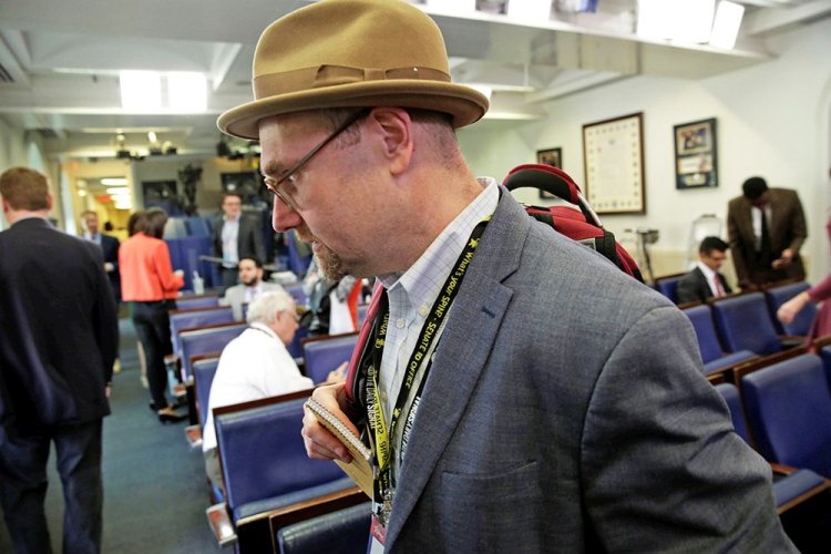 Glenn Thrush, chief White House political correspondent for the The New York Times, works in the White House briefing room on Feb. 24, 2017. 