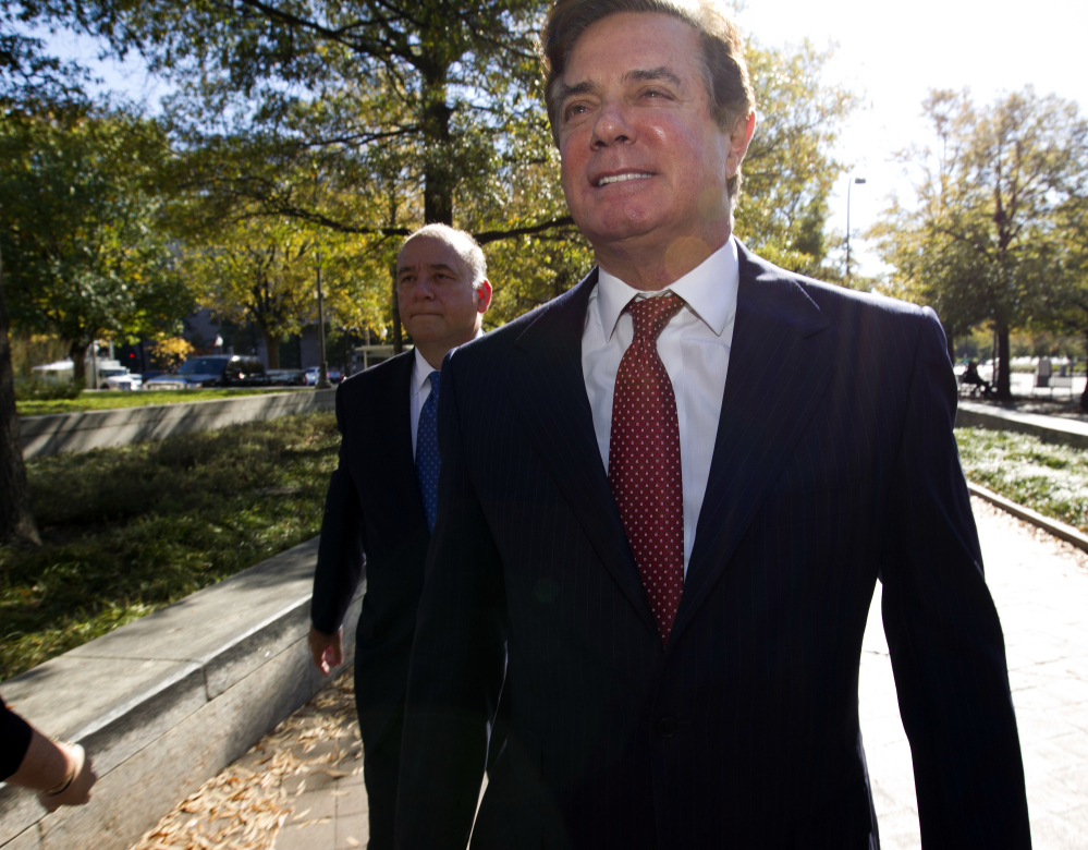 Paul Manafort arrives at federal court in Washington on Nov. 2. Prosecutors working for Special Counsel Robert Mueller say Manafort has been working on an editorial with a long-time colleague "assessed to have ties" to a Russian intelligence service.
