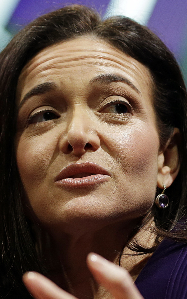 file photo, Facebook Chief Operating Officer Sheryl Sandberg speaks during a forum in San Francisco. Equal Pay Day is being held Tuesday, April 4, 2017, to highlight wage discrimination against women. Activists are holding rallies around the country. Sandberg, who is also the founder of the nonprofit Lean In, launched a new campaign Tuesday: #20PercentCounts, representing the 20 percent less that women make compared with men. Companies big and small are offering discounts, rebates or donating money to women's organizations. (AP Photo/Eric Risberg, File)
