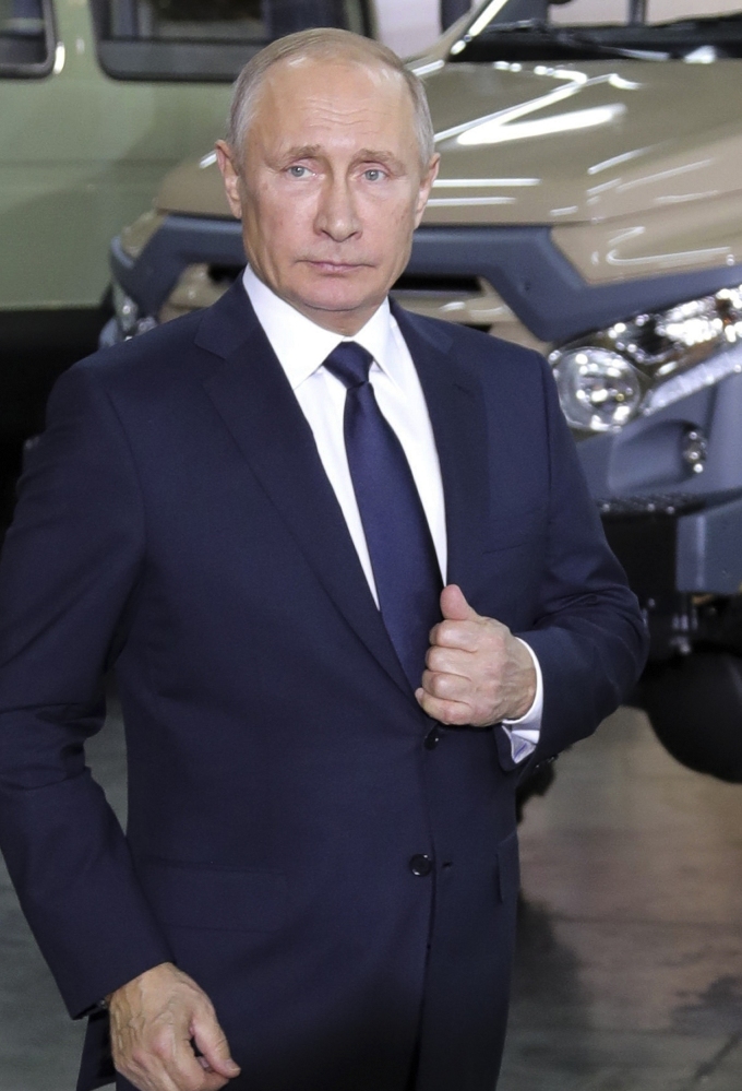 Russian President Vladimir Putin at the auto factory where he unveiled his plans.
