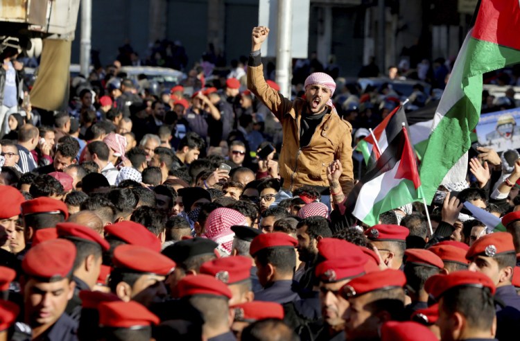 Protesters shout during a protest Friday in Amman, Jordan, after President Trump's decision to recognize Jerusalem as the capital of Israel. Pro-Western Jordan is a crucial U.S. ally in the fight against Islamic extremists, but King Abdullah II cannot afford to be seen as soft on Jerusalem.