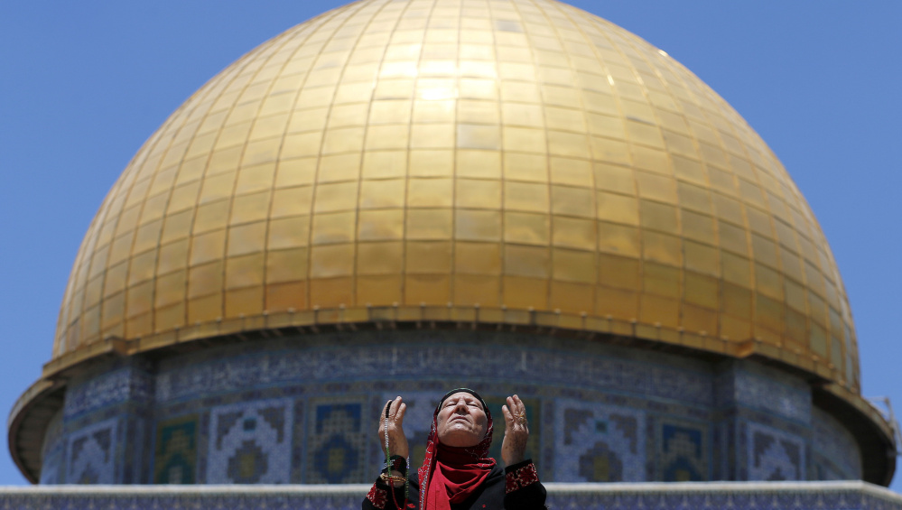 In Jerusalem, a Palestinian prays in front of the Dome of the Rock during Ramadan at the compound known to Muslims as the Noble Sanctuary and to Jews as Temple Mount.