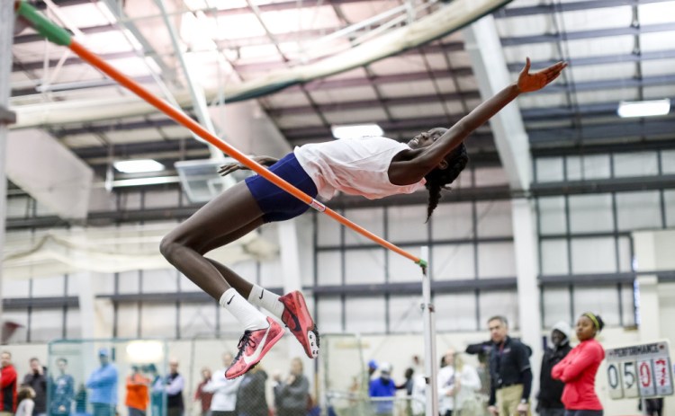 Nyagoa Bayak, a Westbrook High junior, is back to defend her Class A state titles in the high jump and triple jump.
