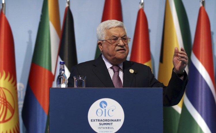 Palestinian President Mahmoud Abbas speaks at a news conference following a summit of 57 Arab nations in Istanbul on Wednesday.