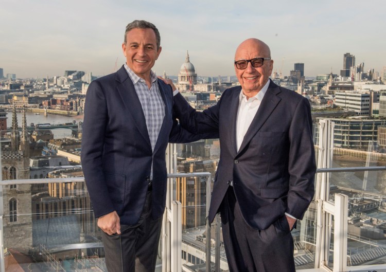 Robert A. Iger, left, chairman and CEO of The Walt Disney Co., and Rupert Murdoch, executive chairman of 21st Century Fox.