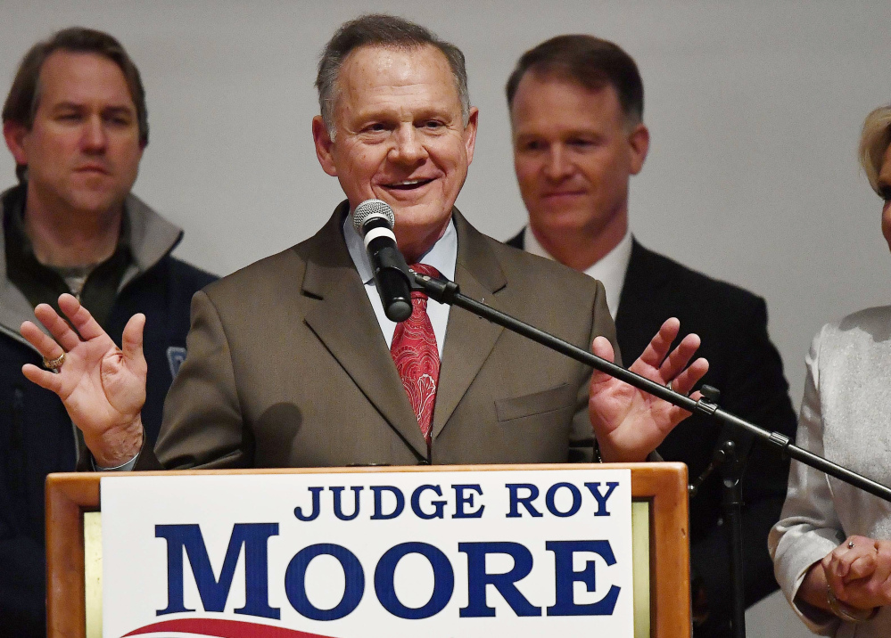Roy Moore lost Alabama's Senate election Tuesday by 20,715 votes, but he says military and provisional ballots yet to be counted might still warrant a recount in the race for Attorney General Jeff Sessions' seat.