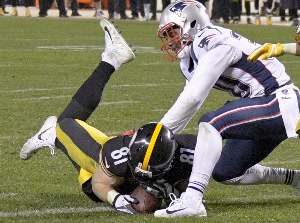 Steelers tight end Jesse James appeared to catch the go-ahead touchdown in the final minute against the Patriots on Sunday, but the play was overturned by replay officials.