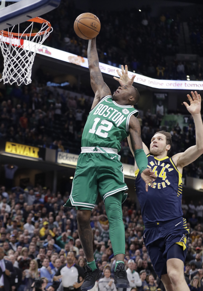 Terry Rozier goes up for the game-winning dunk against Indiana after making a steal and breaking away. Boston won, 112-111.