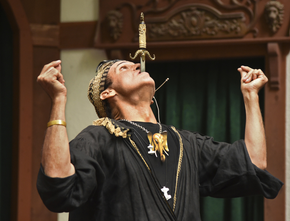 Johnny Fox performs last year at the Renaissance Festival in Crownsville, Md. He died of cancer at 64, surrounded by loved ones who gave him a standing ovation.