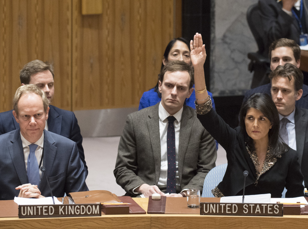 U.S. Ambassador to the United Nations Nikki Haley, right,  told U.N. members Wednesday that President Trump will be keeping track of those who vote against the U.S.