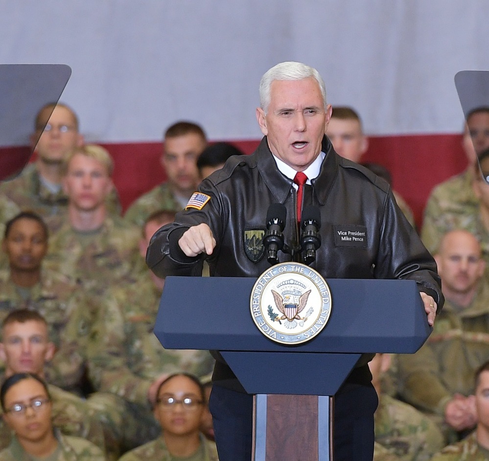U.S. Vice President Mike Pence speaks to troops in a hangar at Bagram Air Base in Afghanistan on Thursday.