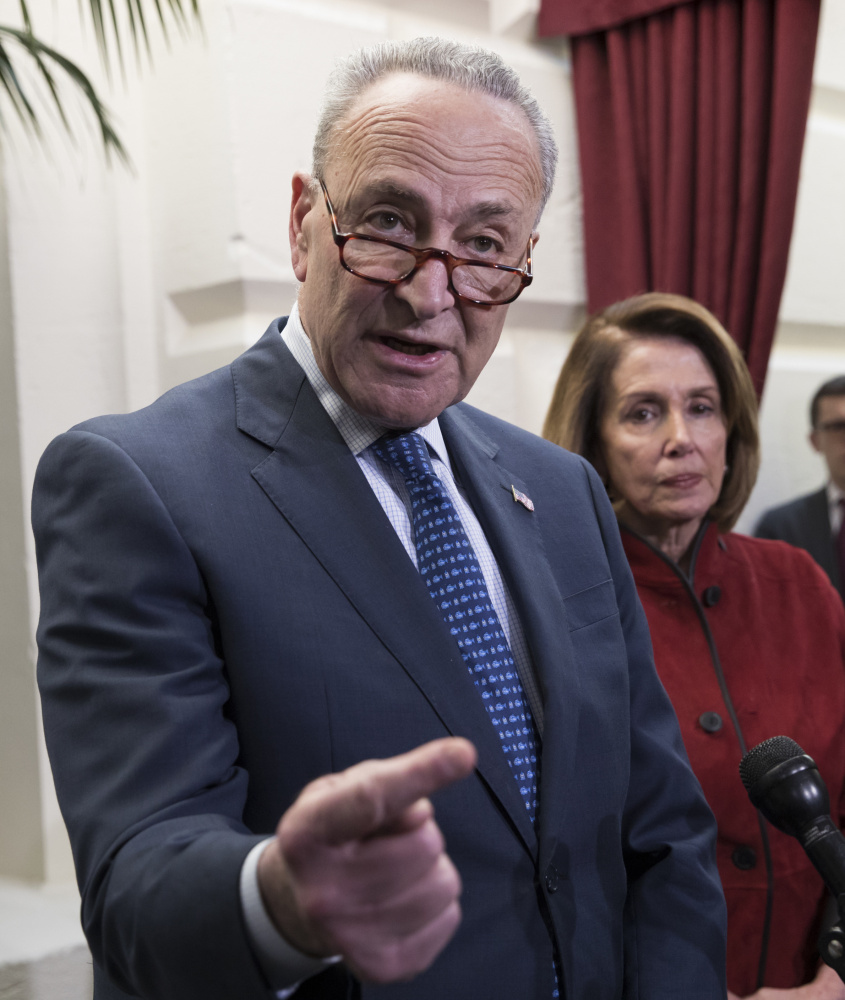 Senate Minority Leader Chuck Schumer, D-N.Y., seen speaking Dec. 13, said Democrats "are not going to allow things like disaster relief go forward without discussing some of the other issues we care about."