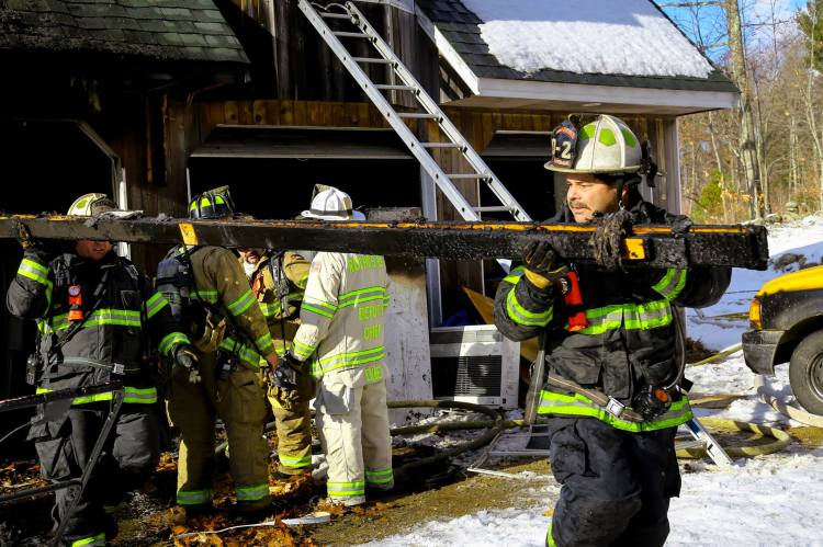 Members of the South Berwick Fire Department help the Lebanon department at a fatal fire in Shapleigh. 
