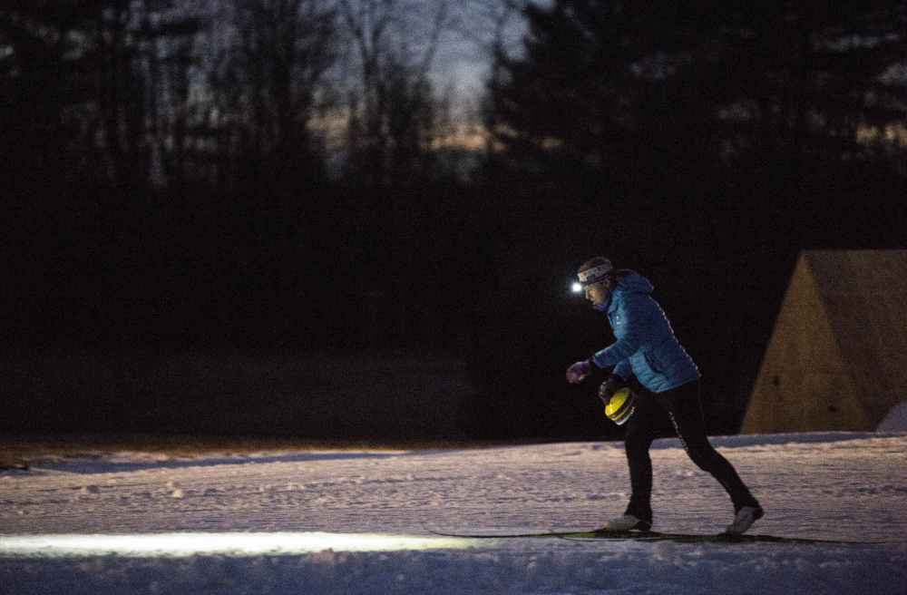 A member of the Colby College ski team enjoys early season Nordic skiing at Quarry Road Trails on Thursday.