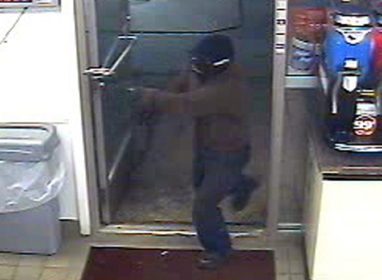 A video surveillance image shows a robbery suspect enter a Circle K store in Fairfield on Sunday night.