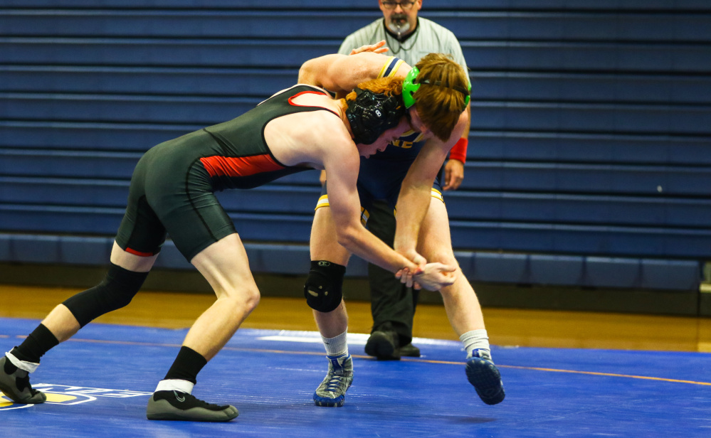 Contributed photo/USM athletics 
 University of Southern Maine sophomore Peter Del Gallo, back, gets a hold of Shawn Ferrell of Bridgewater State during a 125-pound match at the Costello Sports Complex in Gorham. Del Gallo pinned Ferrell in 48 seconds.