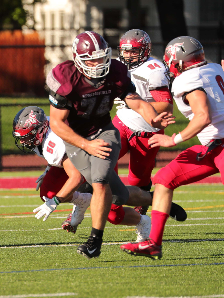 Chris Hayden was never an offensive lineman until last year. This season, the Madison graduate was one of leader's of a Springfield College line that led all of Division III football in rushing.