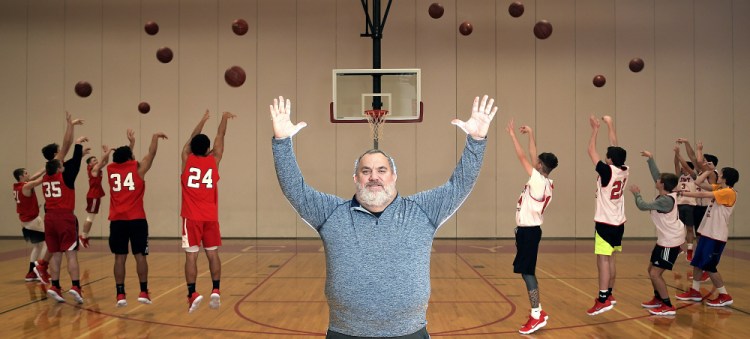 Cony High School boys basketball coach T.J. Maines puts an emphasis on three-point shots during the season.