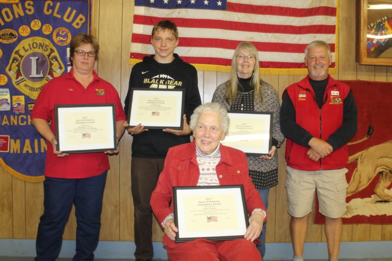 The Manchester Lions recently presented its Youth, Adult, Senior and Special Project awards. In front is Callie Fournier, in back, from left, are Lion Deb Maddox, Dylan Burroughs, Carolyn Van Horn and Manchester Spirit of America organizer and emcee David Worthing.