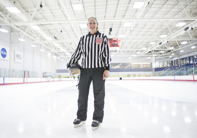 Jessica Leclerc, 32, poses at the University of Southern Maine Ice Arena on Wednesday night. The Augusta native is one of four American women selected to officiate the women's hockey tournament in the 2018 Olympic Games.