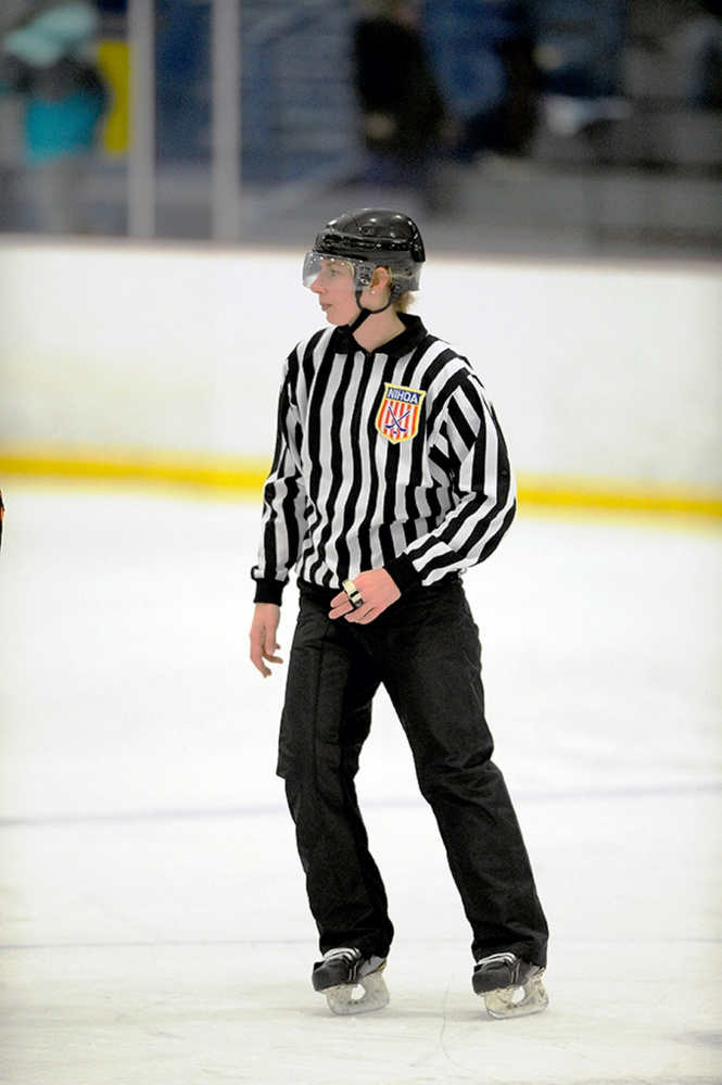 Jessica Leclerc, a Cony High School graduate, works a game at the Biddeford Ice Arena in January 2017. Leclerc will officiate some women's hockey games at the 2018 Olympics.
