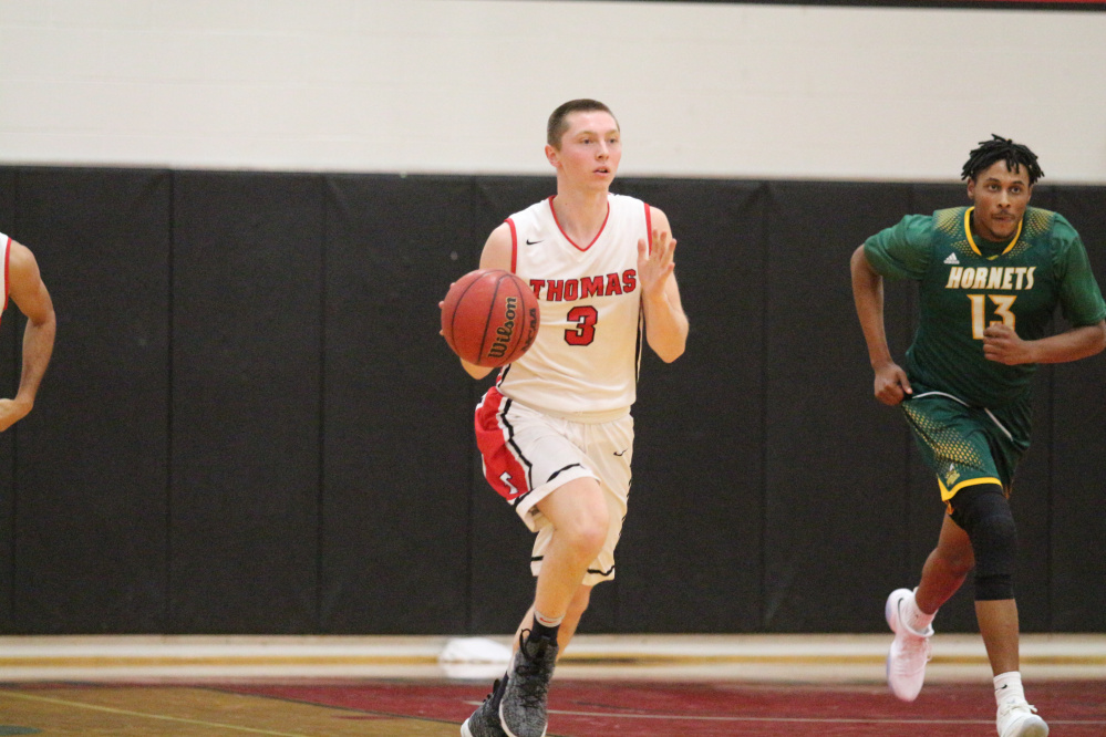 Sophomore guard Zach Mackinnon leads Thomas College with 13.5 points per game.