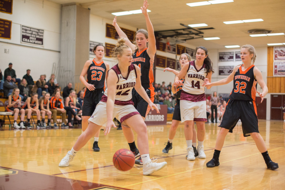 Nokomis freshman Alexys Mayhew, front, looks for an open teammate during a Kennebec Valley Athletic Conference Class A game against Skowhegan on Monday night in Newport.