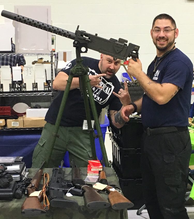 Ignazio "Iggy" Falcone, of Manchester, New Hampshire, poses early this year with a Browning M1919 belt-fed rifle at a gun show in Manchester, New Hampshire. Falcone was arrested Sunday at a gun show in Augusta after allegedly violating a protection order the previous day by handling a shotgun.