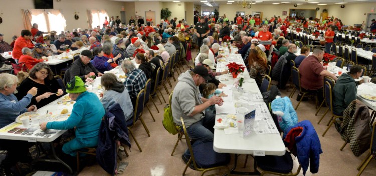Diners fill the room Dec. 25,  2016, for the annual Central Maine Family Christmas Dinner at the Elks Lodge in Waterville. This year's free dinner will be held Monday and has a new head organizer, Jeff Cucci.