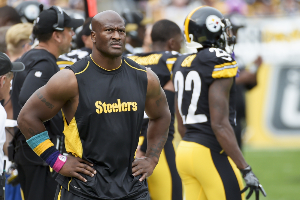 Former Pittsburgh outside linebacker James Harrison walks the sidelines as the Steelers plays against the Jacksonville Jaguars in an October game in Pittsburgh. Harrison was released by Pittsburgh on Saturday and signed with the New England Patriots on Tuesday.
