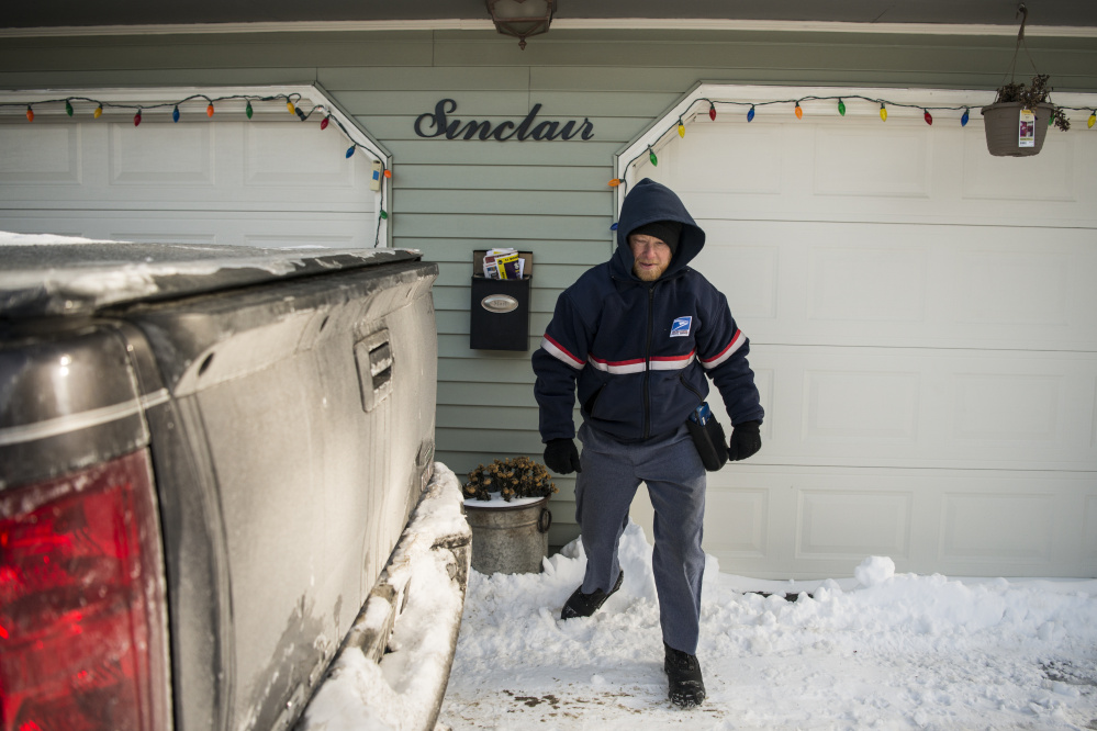 Despite deep freeze, work continues across central Maine
