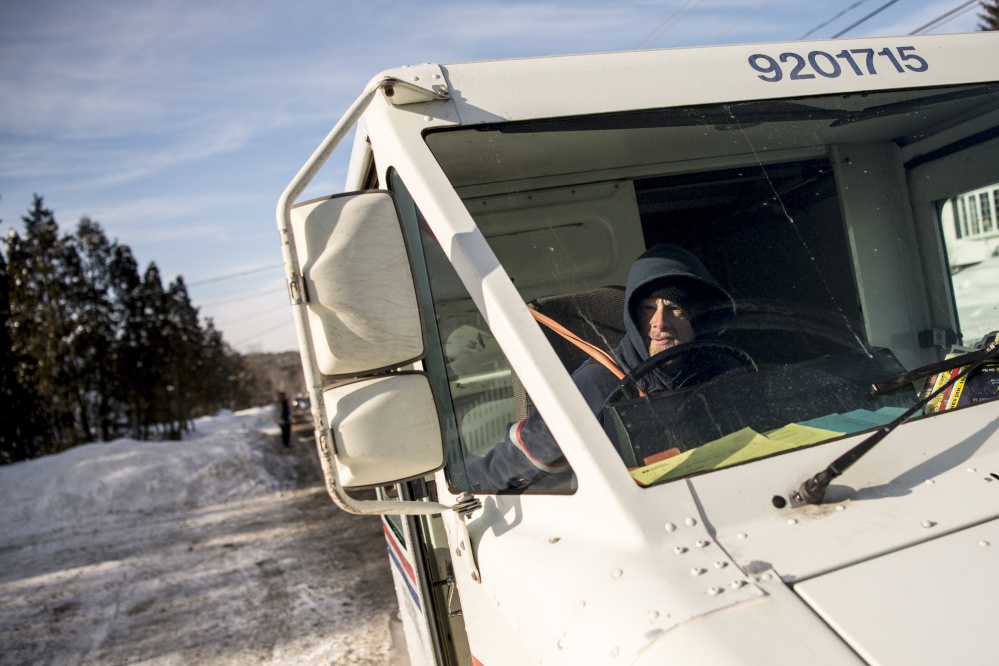 Despite deep freeze, work continues across central Maine