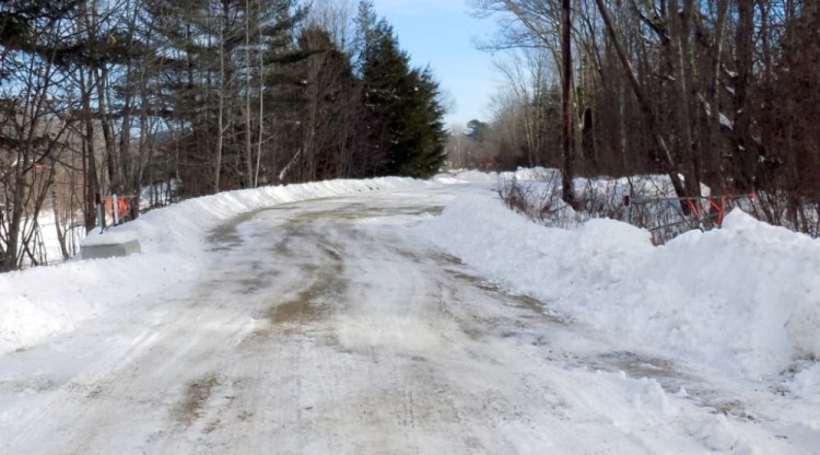 Chesterville selectmen will ask voters to approve discontinuing a portion of Webber Road at the March 12 Town Meeting. At issue is this gate, seen open, which was put up with the approval of a prior board in an effort to limit littering on Chris Osgood's property beyond the gate.
