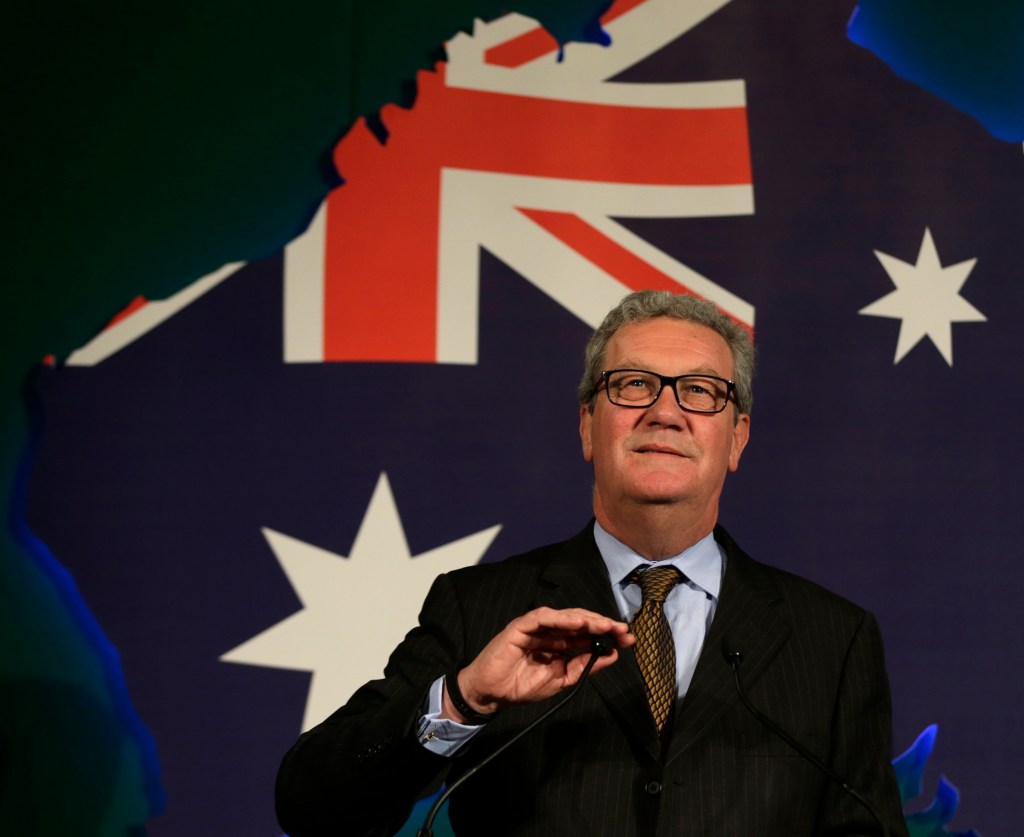 This June 22, 2015, file photo shows Australian High Commissioner Alexander Downer, left, speaking to guests during a welcome party at the Australian High Commission in London. Trump campaign adviser George Papadopoulos told the diplomat, Downer, during a meeting in London in May 2016 that Russia had thousands of emails that would embarrass Democratic candidate Hillary Clinton, the report said. Australia passed the information on to the FBI after the Democratic emails were leaked, according to The New York Times, which cited four current and former U.S. and foreign officials with direct knowledge of the Australians’ role.