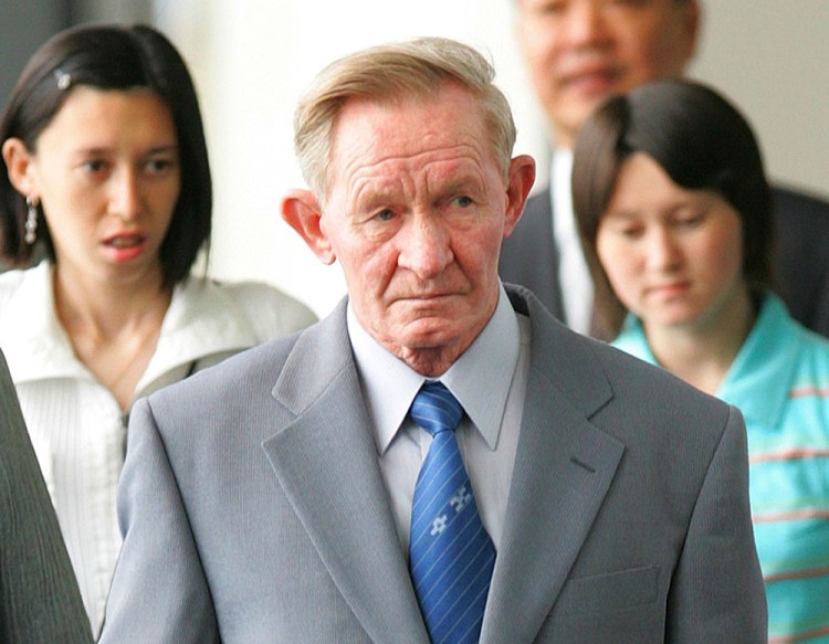 Former U.S. Army deserter Charles Jenkins, together with his daughters Mika, left, and Brinda at Narita International Airport on June 14, 2005. After being freed from North Korea in 2002, Jenkins, who had married a Japanese abductee,  lived in Japan. 