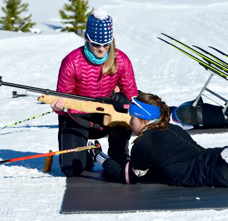U.S. Paralympic Nordic Skiing head coach Eileen Carey, a Leeds native, works on marksmanship with Paralympian Oksana Masters during biathlon training in preparation of the 2018 Winter Paralympic Games in Pyeongchang, South Korea.
