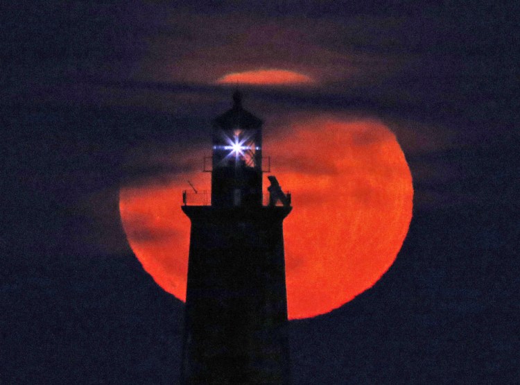 The only supermoon of 2017, shown rising behind Ram Island Ledge Light in Cape Elizabeth Sunday evening, reached its perigee at 3:45 a.m. Monday, witnessed perhaps by just a few night owls. But there will be two supermoons in January.