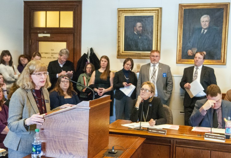 Julie Flynn, deputy secretary of state, testifies before the Veterans and Legal Affairs Committee on Wednesday. She said that limits on political activity in polling places in other states have survived legal challenges.